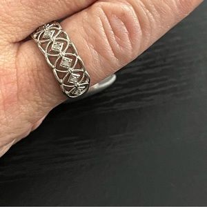 1/10 carat T.W. Diamond and sterling silver open work ring